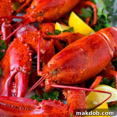 How to cook a lobster with boiled lobsters on a serving platter.