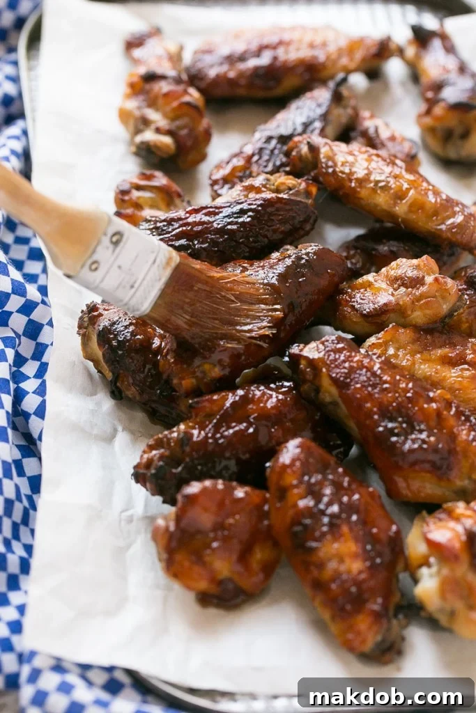 Platter of Dr. Pepper baked wings, saucy and ready for a football game party