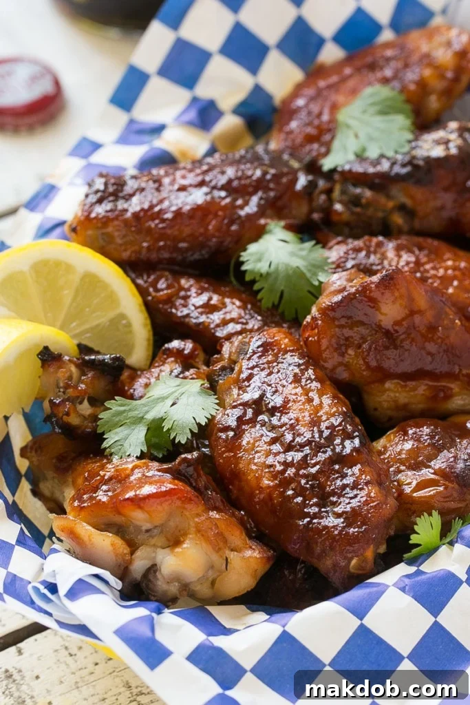 Baked chicken wings with Dr. Pepper BBQ sauce and a refreshing drink