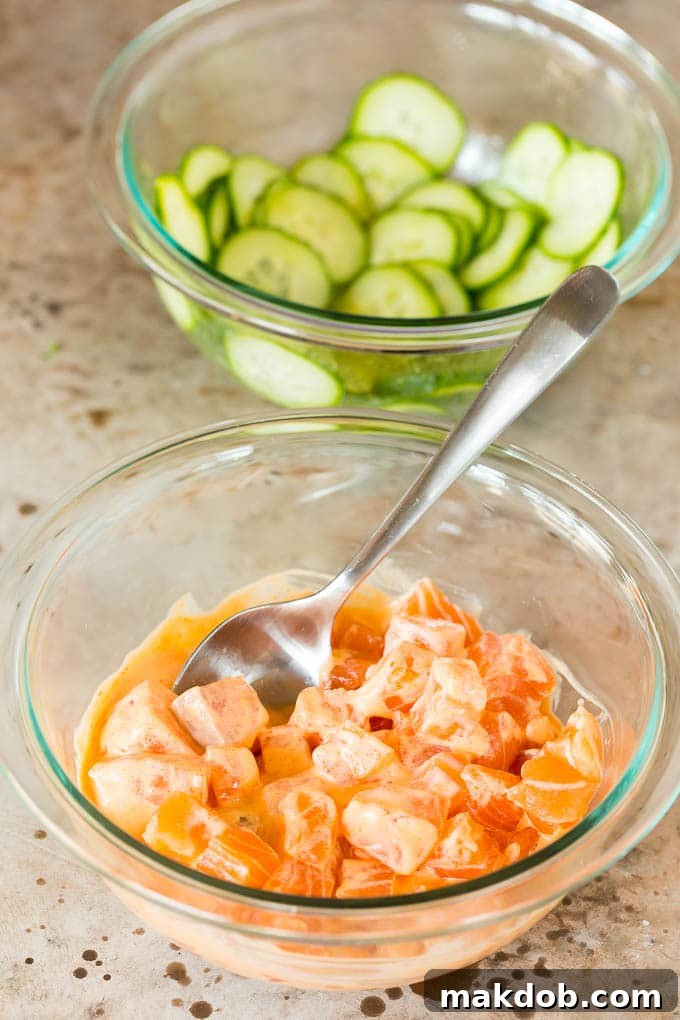 This sushi bowl recipe is assorted fresh fish, avocado, cucumber and seaweed, all served over rice with spicy mayo, picked ginger and tobiko. Bowls of marinated cucumbers and salmon in spicy mayo.