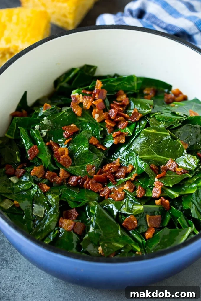 These Southern style collard greens are simmered with bacon and seasonings until tender and flavorful. A pot of beautifully cooked collard greens, rich in color and texture, generously topped with an abundance of crispy bacon bits.