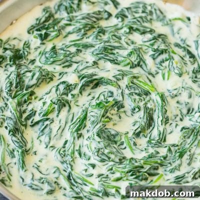 A pan of creamed spinach, rich and ready to be served.