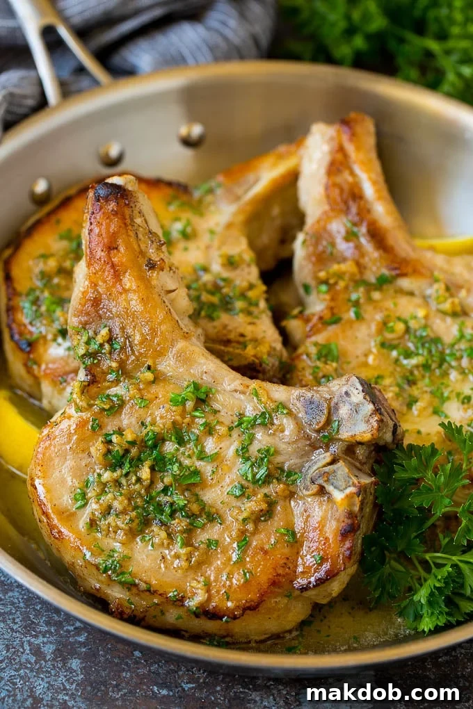 Deliciously cooked pork chops after being perfectly brined. Perfectly cooked brined pork chops, golden brown and ready to serve.