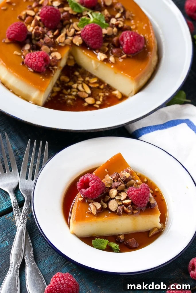 This rich and creamy flan is flavored with vanilla and almonds and is finished off with chopped honey roasted almonds and raspberries.