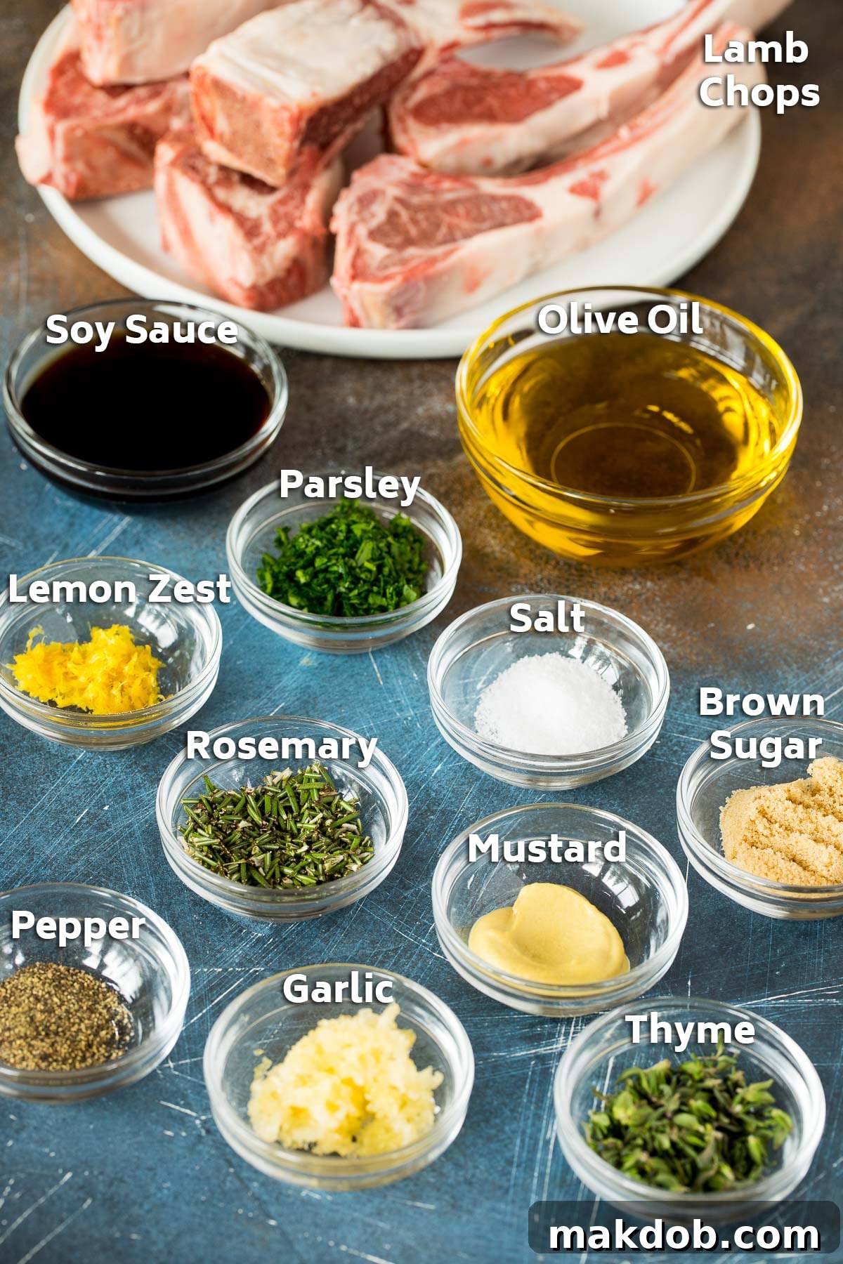 Flame-Kissed Lamb Chops 3 Bowls of ingredients including olive oil, garlic, herbs and spices laid out for making the lamb chop marinade.