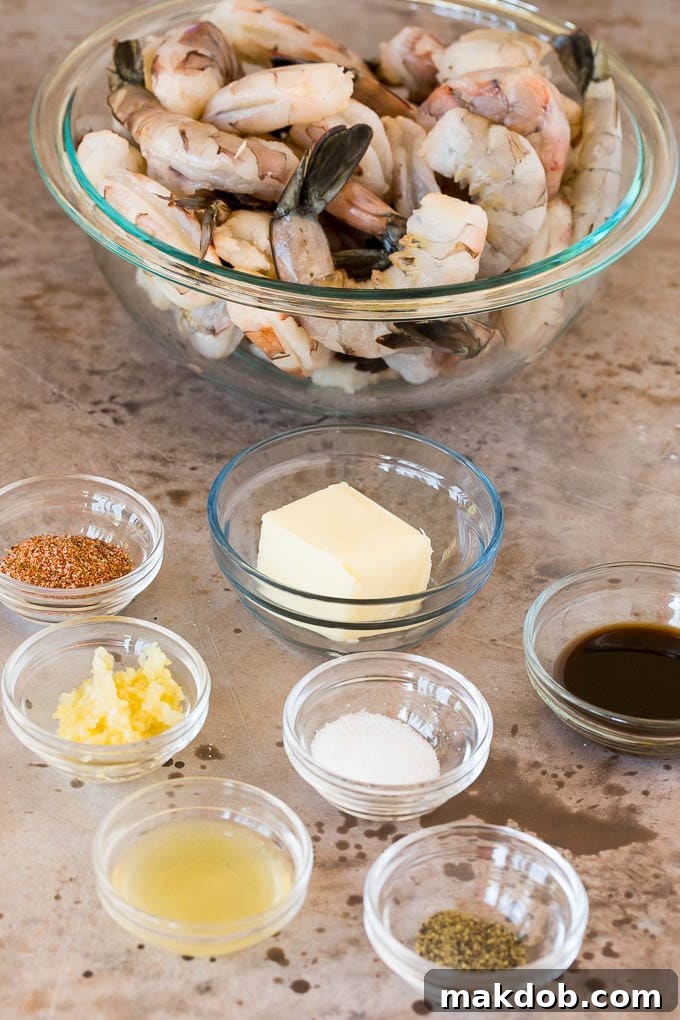 Bowls of ingredients including shrimp, butter and seasonings.