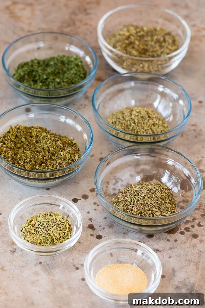 This homemade Italian seasoning is a blend of a variety of herbs and spices that creates a flavorful mix that can be used for so many different dishes. Small bowls of various herbs and spices.