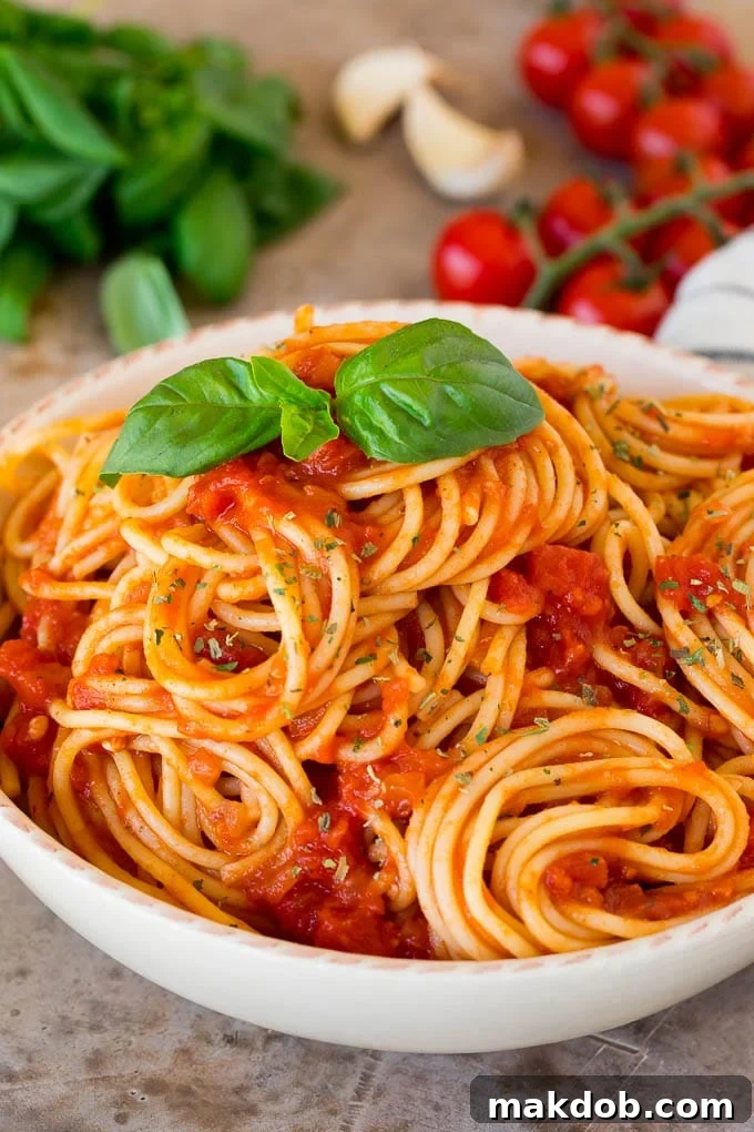 This homemade Italian seasoning is a blend of a variety of herbs and spices that creates a flavorful mix that can be used for so many different dishes. Italian seasoning sprinkled over a bowl of spaghetti.