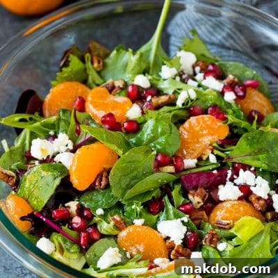 Christmas salad with oranges, pomegranate and candied pecans.