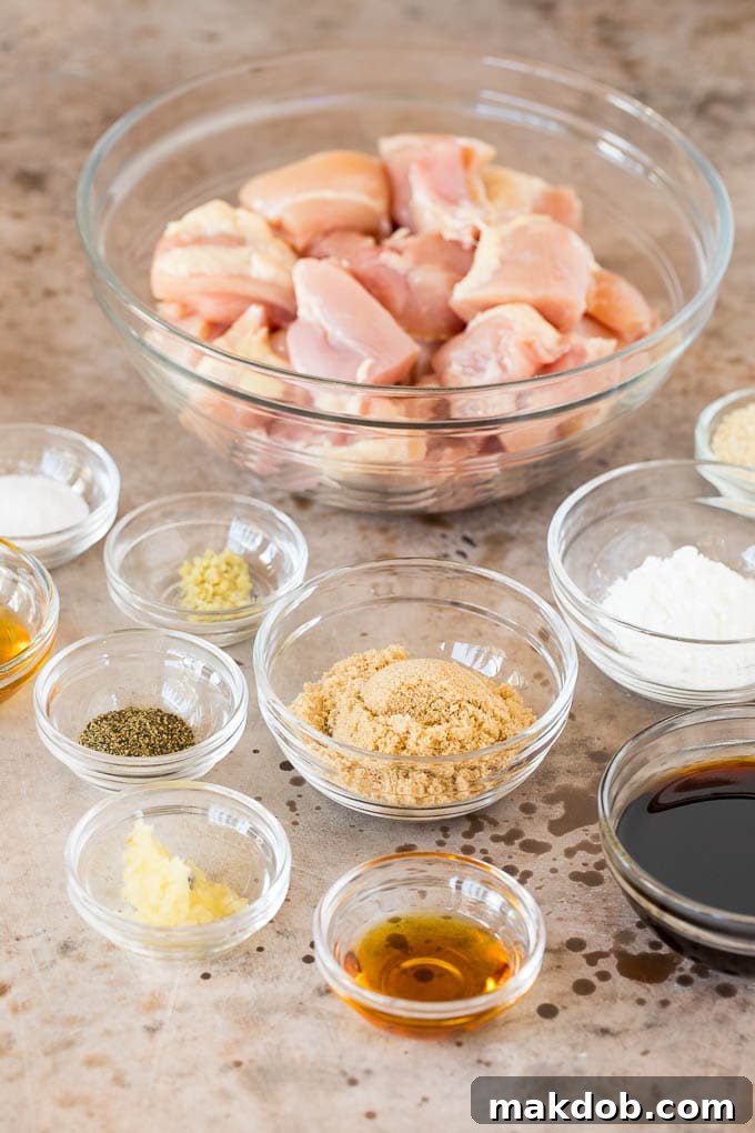 Fresh ingredients laid out, showcasing the quality components for a homemade teriyaki sauce. Bowls of ingredients including chicken, soy sauce, brown sugar, garlic, and ginger ready for Instant Pot teriyaki chicken preparation.