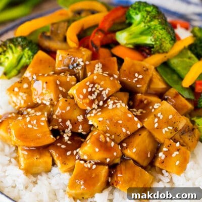 Savory Teriyaki Chicken Rice Bowl 2 Teriyaki chicken bowl with vegetables served over rice.