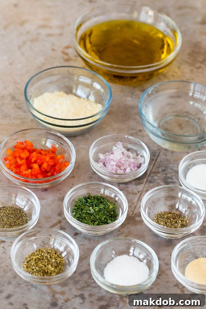 Fresh Ingredients for Homemade Italian Dressing Various bowls of fresh ingredients including olive oil, dried herbs, and spices laid out for Italian dressing preparation.