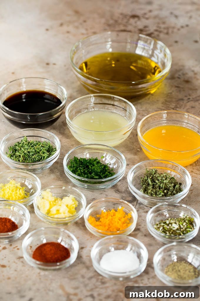 Turkey Marinade Ingredients Prep Bowls of olive oil, soy sauce, citrus juices, seasonings and herbs.
