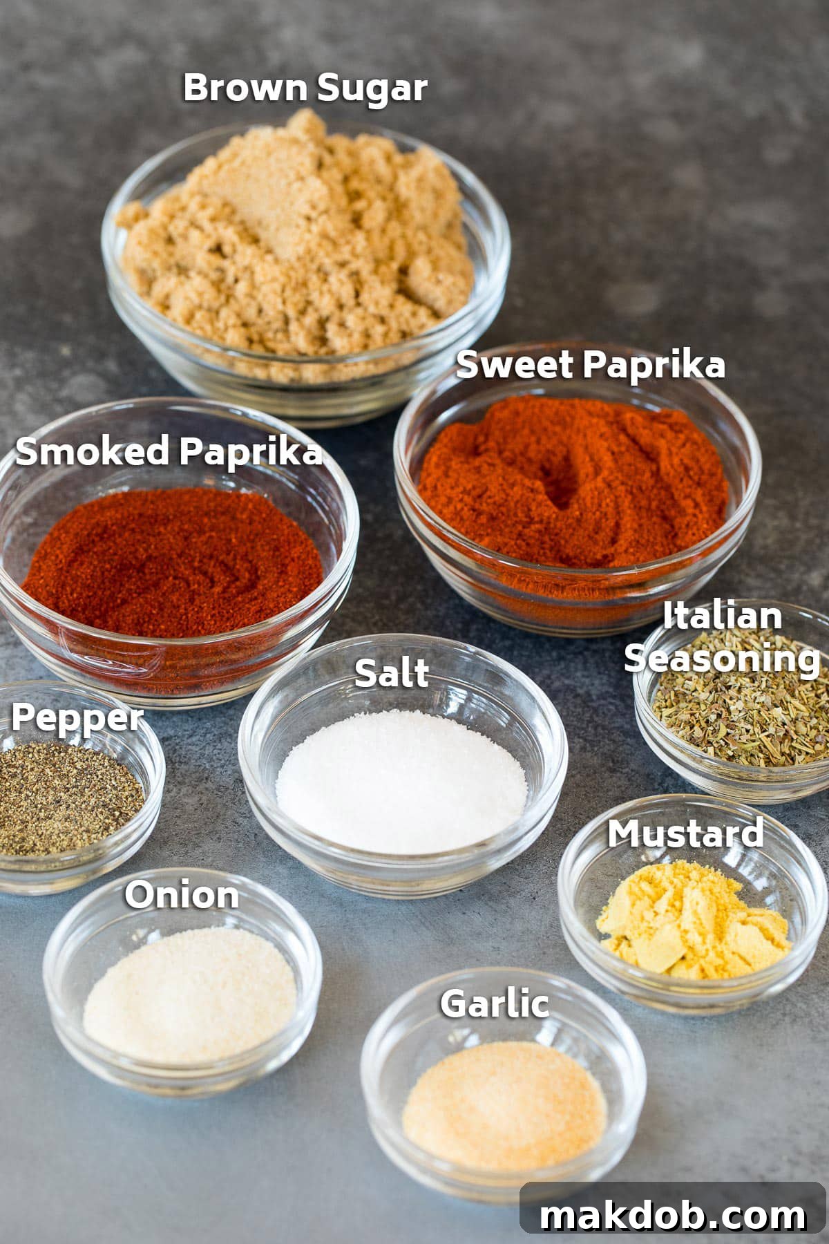 Signature Salmon Seasoning Blend 3 Bowls of various herbs and spices to make seasoning.