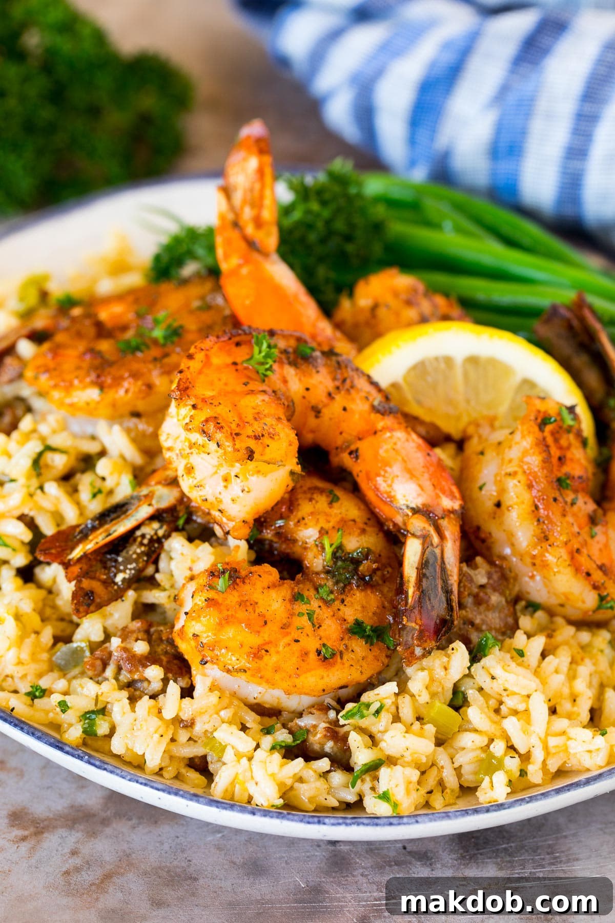 Savory Cajun Dirty Rice 6 Cajun shrimp served over a plate of dirty rice.