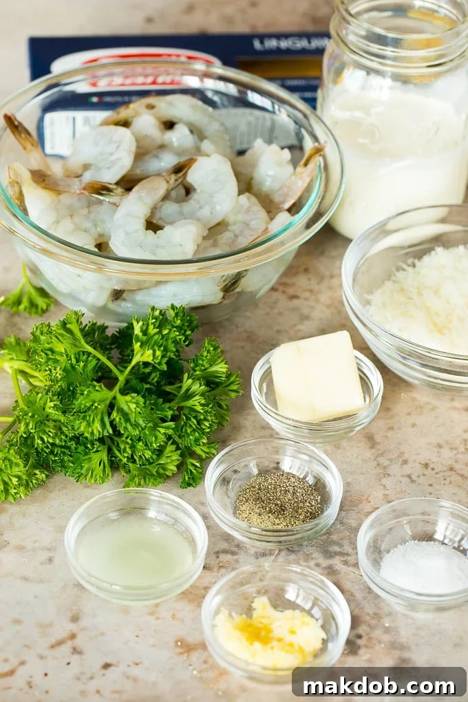 Bowls of shrimp, butter, seasonings and cream.