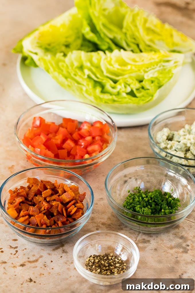 Crisp Wedge Salad with Blue Cheese 3 Bowls of bacon, tomatoes, chives, blue cheese and pepper.