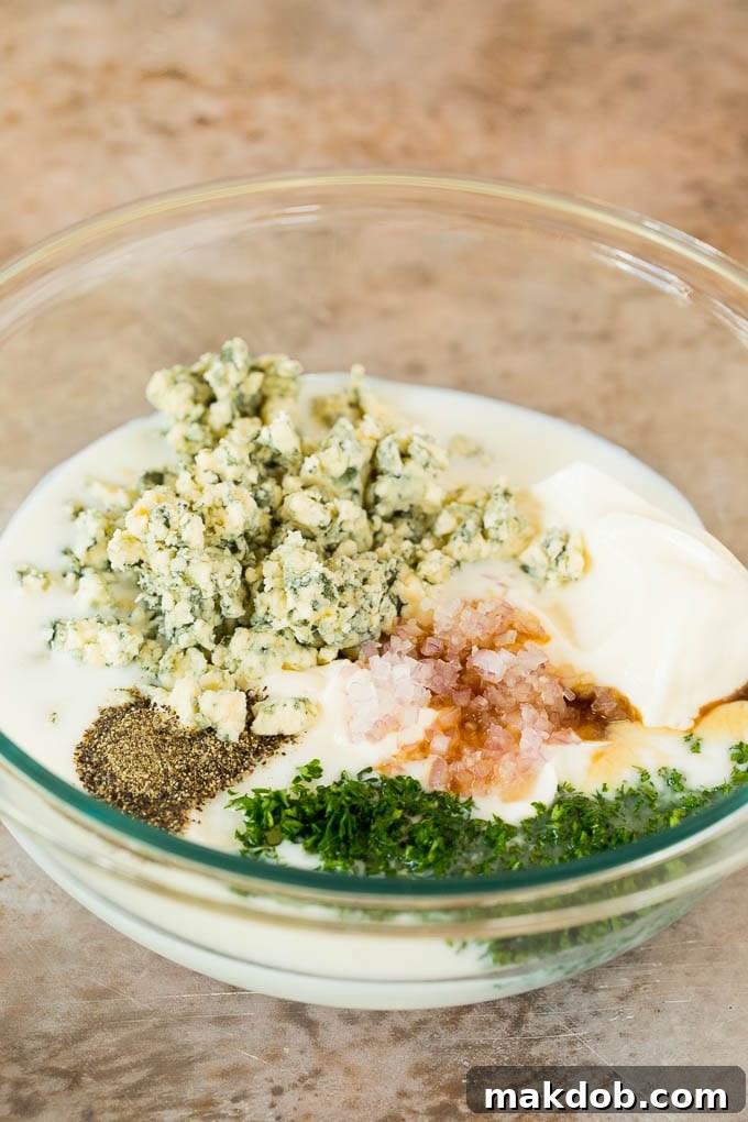 Crisp Wedge Salad with Blue Cheese 4 Ingredients in a bowl for blue cheese dressing.