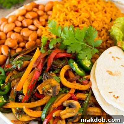 Plant-Powered Fajitas 7 A platter of vegetarian fajitas served with rice and beans.