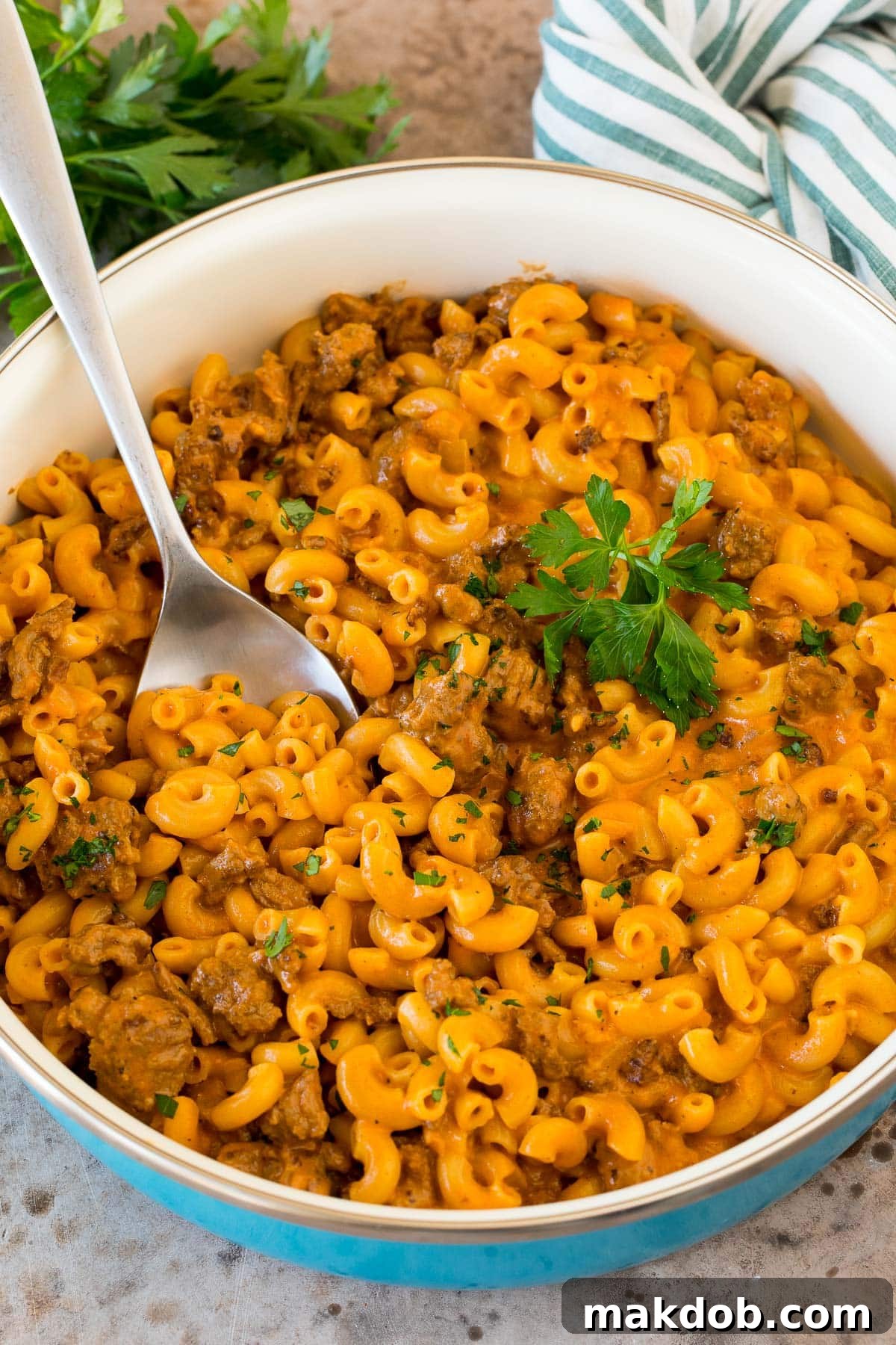 Better-Than-Box Hamburger Helper 6 A pan of homemade hamburger helper with a spoon in it.