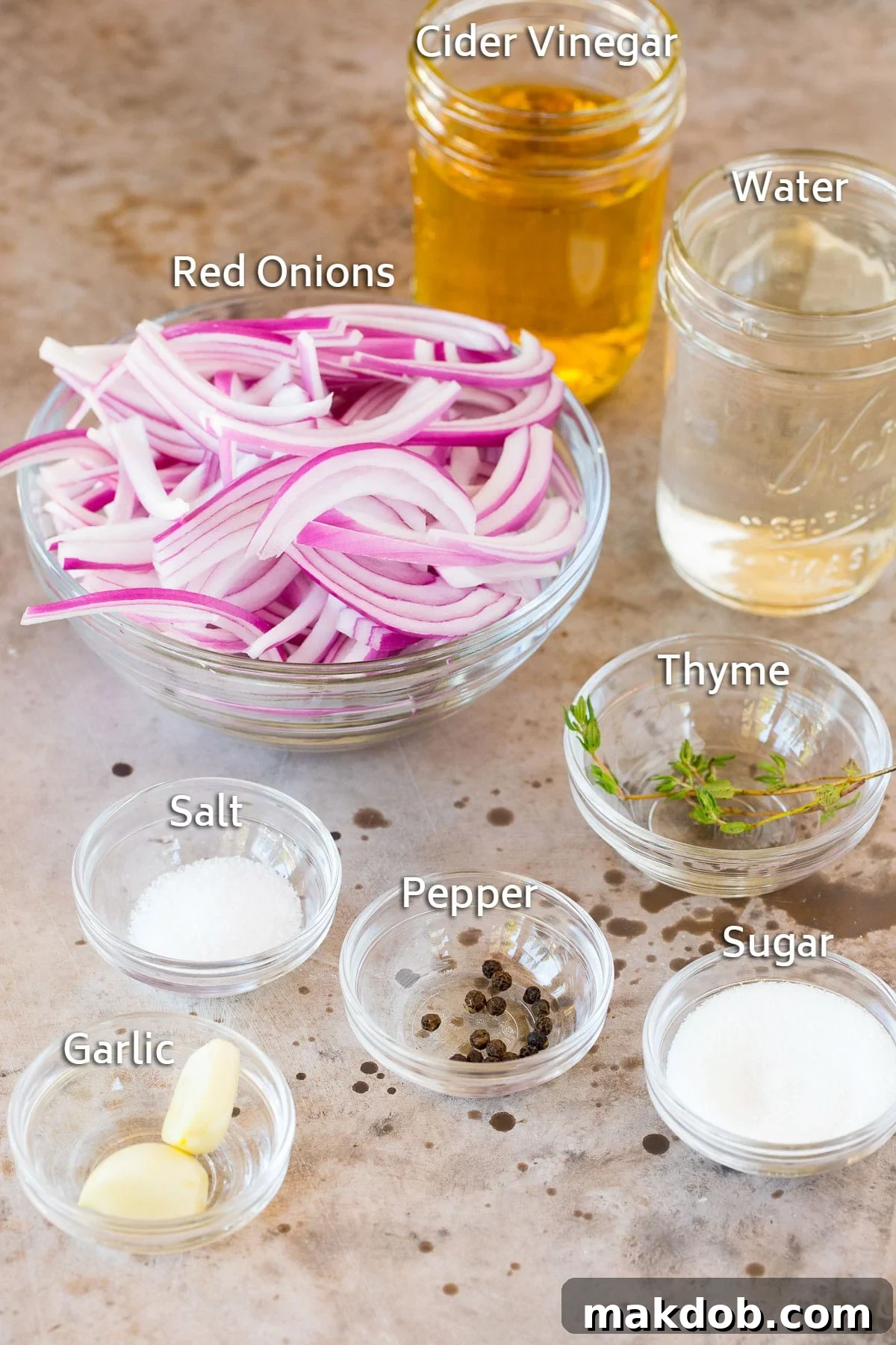 Ruby Red Pickled Onions 3 Bowls of ingredients including onions, spices, vinegar and water.