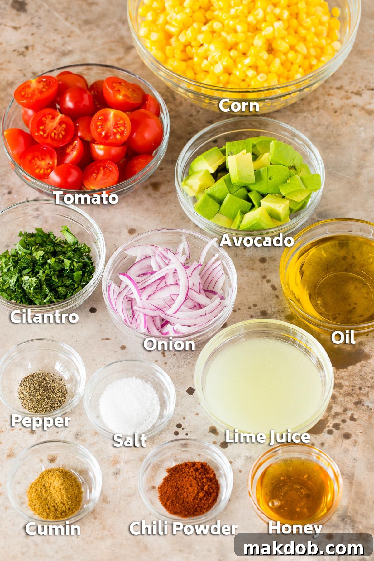 Bowls of ingredients including vegetables, cilantro and seasonings.