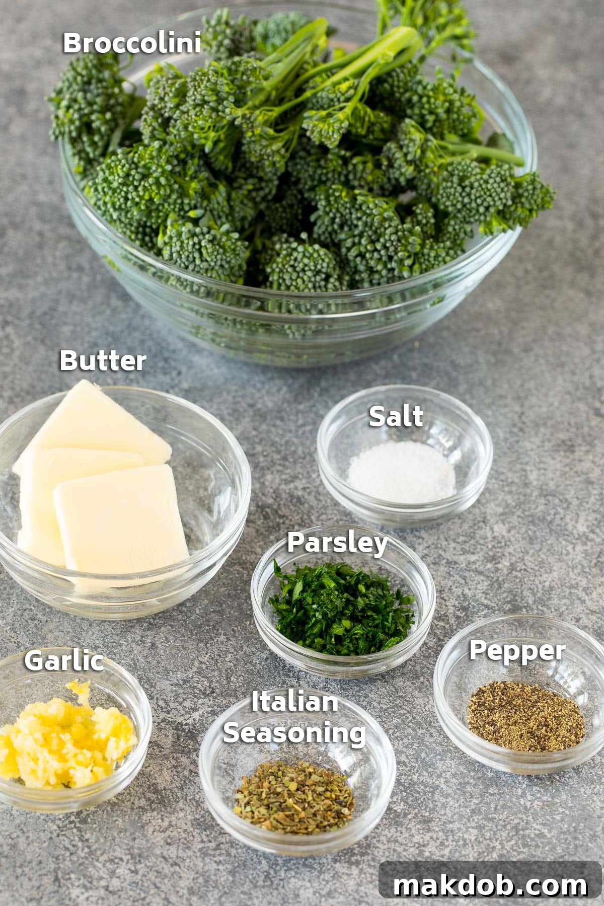 Flavorful Pan-Seared Broccolini 3 Bowls of ingredients including baby broccoli, butter, and seasonings, neatly arranged.