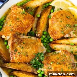 20 Easy One-Pot Chicken Dinners 11 Elegant Chicken Vesuvio featuring tender chicken thighs, peas, and roasted potatoes in a delicate white wine sauce.