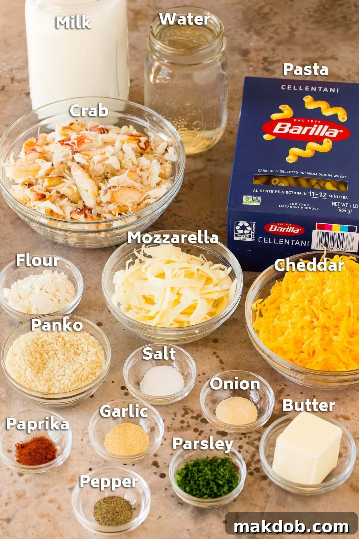 Decadent Crab Macaroni 3 Ingredients including pasta, cheese, crab, milk and spices.