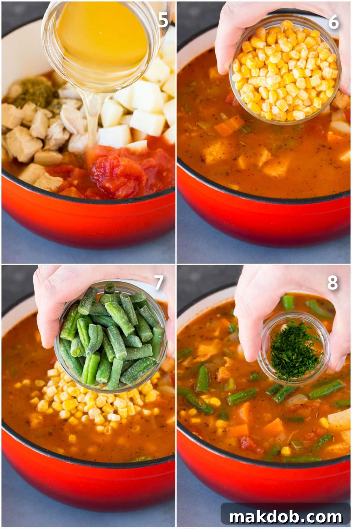 A close-up view of a pot of turkey vegetable soup, showing diced turkey and a colorful mix of vegetables, with fresh parsley being sprinkled on top as a garnish.