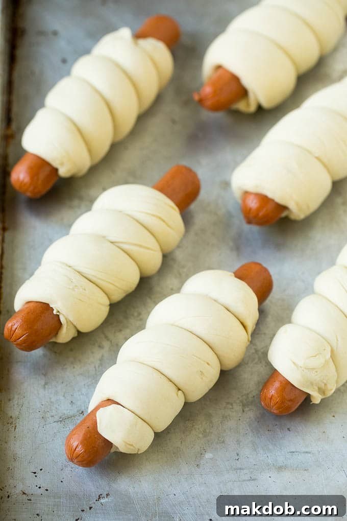 Homemade bagel dough wrapped around hot dogs.