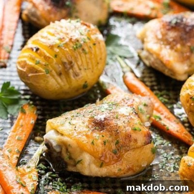 This recipe for maple dijon chicken with hasselback potatoes and carrots is a healthy and easy one pan meal that the whole family will love!