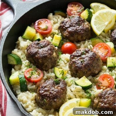 This recipe for one pot greek meatballs with lemon dill rice includes savory greek spiced beef meatballs, creamy arborio rice and vegetables, all cooked together in a single pot!