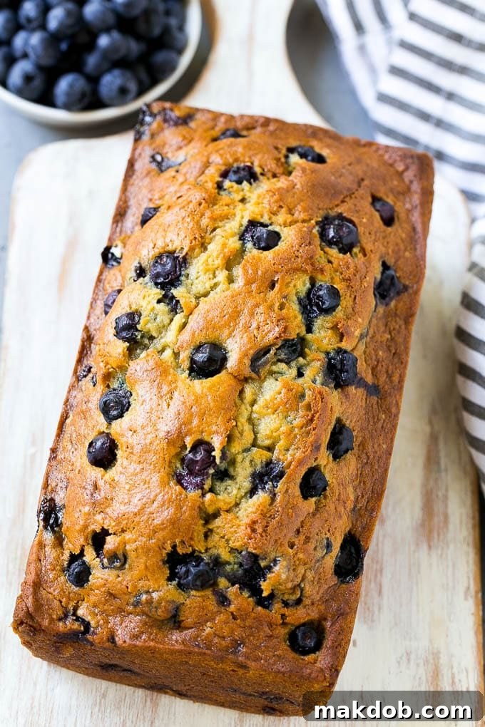 Blueberry Banana Bread | Easy Banana Bread | Homemade Banana Bread Recipe A loaf of blueberry banana bread.