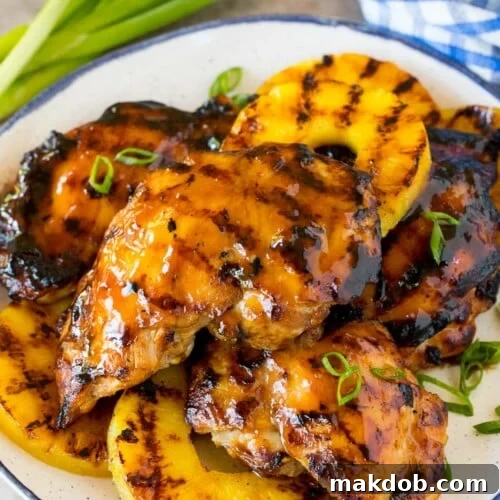 Grilled chicken coated in teriyaki marinade that has been grilled, served with pineapple.