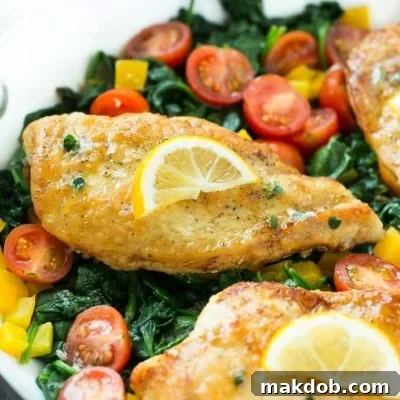 Golden-Brown Chicken & Wilted Spinach Skillet 6 Pan seared chicken breast with spinach and lemon butter sauce.