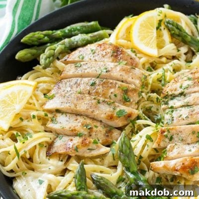 This recipe for lemon asparagus pasta combines tender asparagus and grilled chicken with pasta in a lemon cream sauce. It's a delicious and hearty entree that everyone will want seconds of!