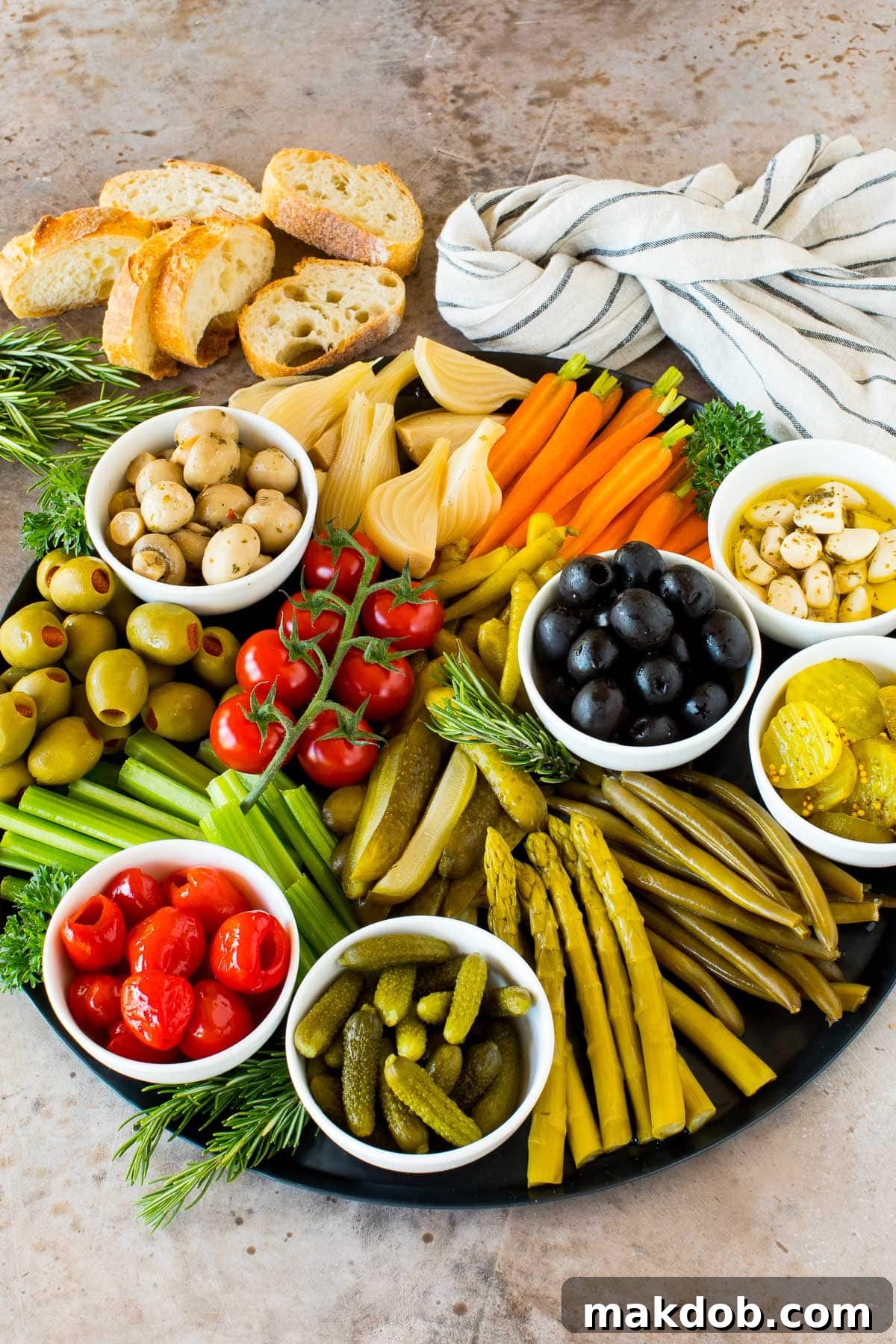 A vibrant relish tray overflowing with an assortment of pickles, crisp fresh vegetables, and flavorful marinated veggies.