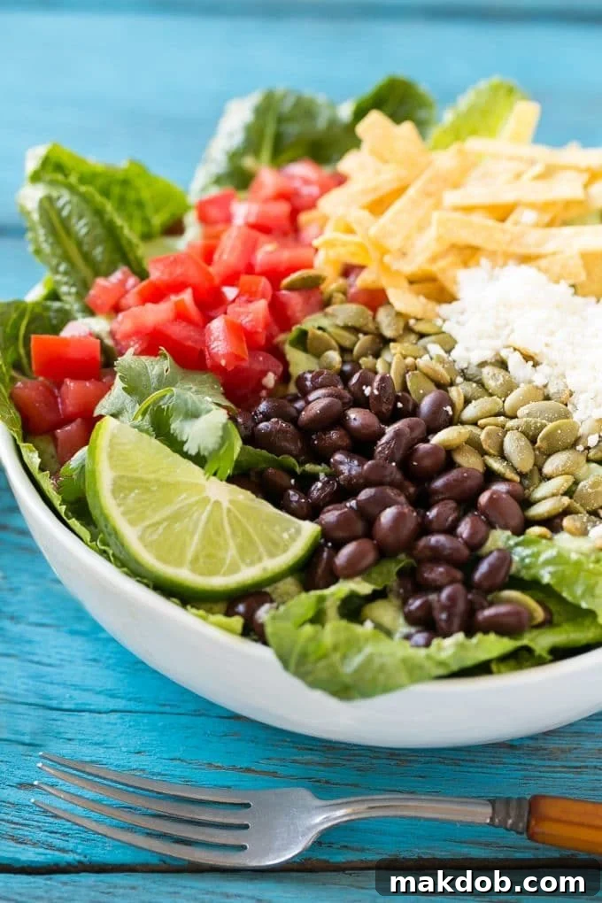 Mexican Caesar Salad Recipe | Caesar Salad | Mexican Salad #salad #beans #lunch #dinner #dinneratthezoo Mexican Caesar salad with black beans, tomatoes, cotija cheese and tortilla strips.