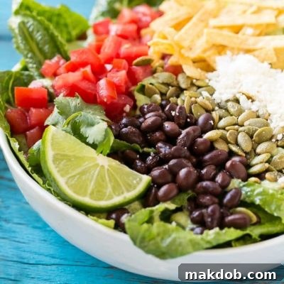 Fiesta Caesar Salad 2 This recipe for mexican caesar salad is crisp romaine lettuce tossed in a creamy cilantro dressing, then finished off with a variety of fun toppings. It's caesar salad in a whole new way that might be even better than the original!