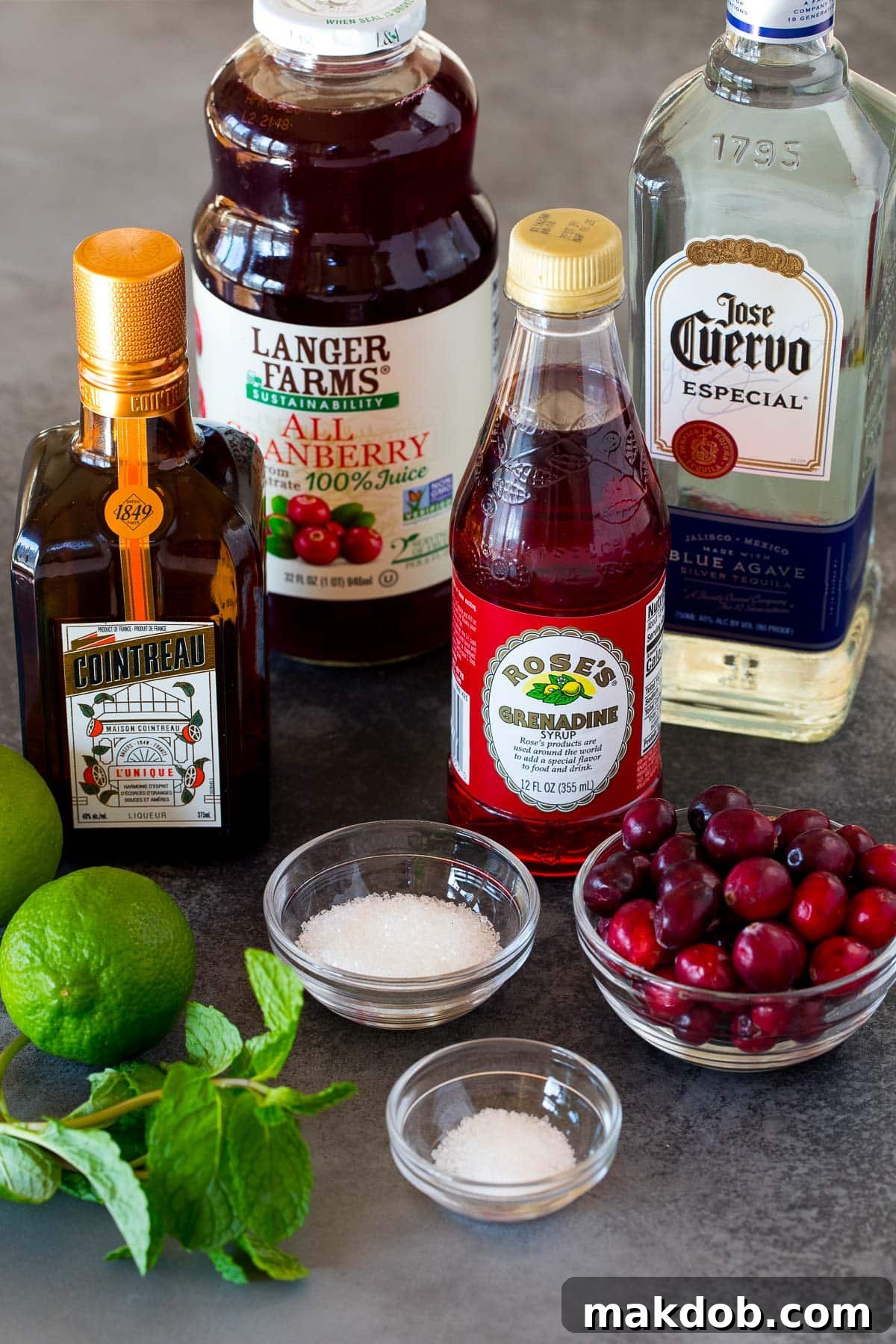 Ingredients including tequila, triple sec, cranberry juice, and grenadine.