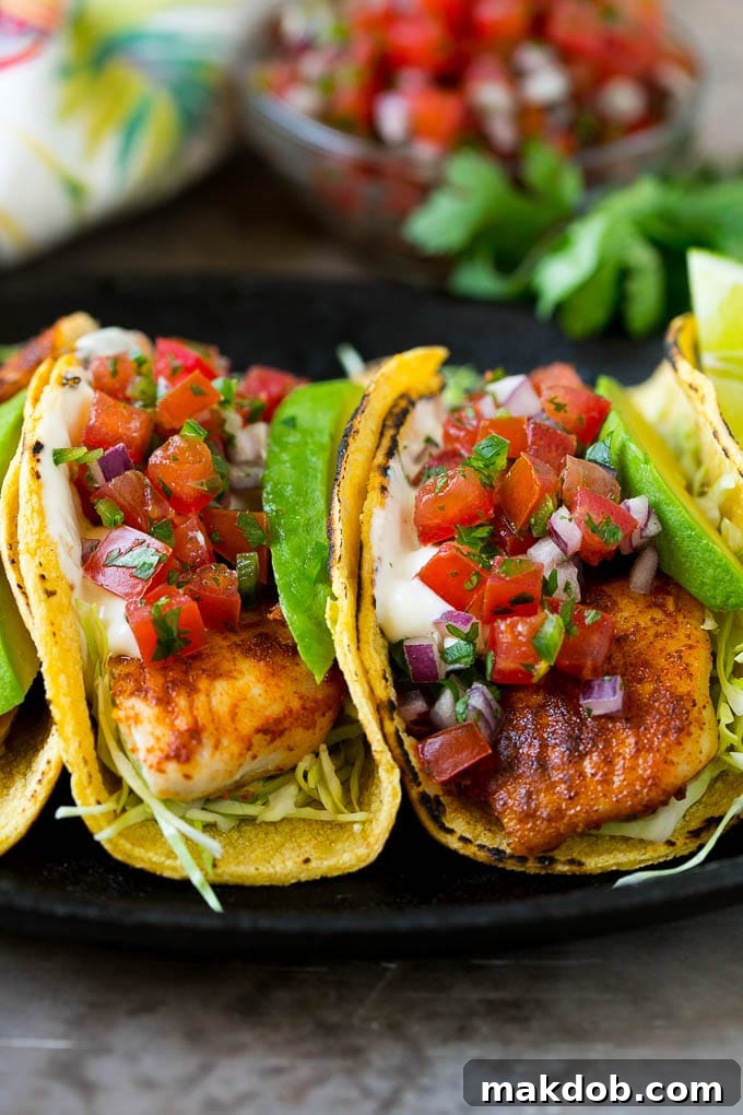 Fish Tacos Recipe | Tilapia Fish Tacos #tacos #fish #tacotuesdady #avocado #dinner #dinneratthezoo Fish tacos with cabbage, avocado, salsa and creamy sauce.