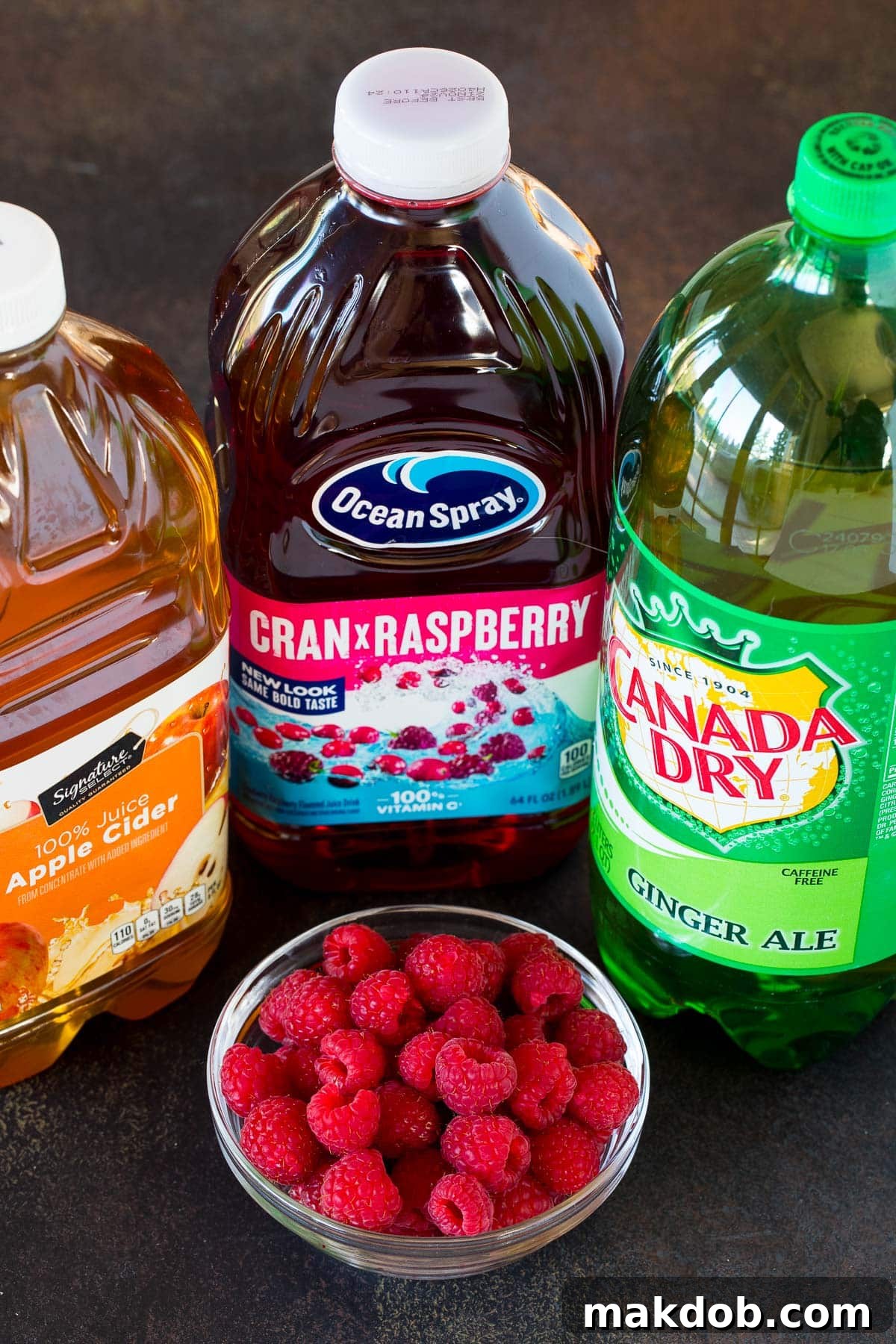 Witch's Brew 3 Bottles of premium ginger ale, rich cranberry raspberry juice, and classic apple cider, essential ingredients for the perfect Halloween punch.