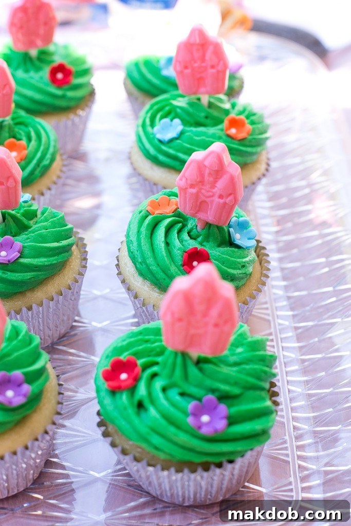 Princess Castle Themed Cupcakes with Green Frosting and Castle Lollipops