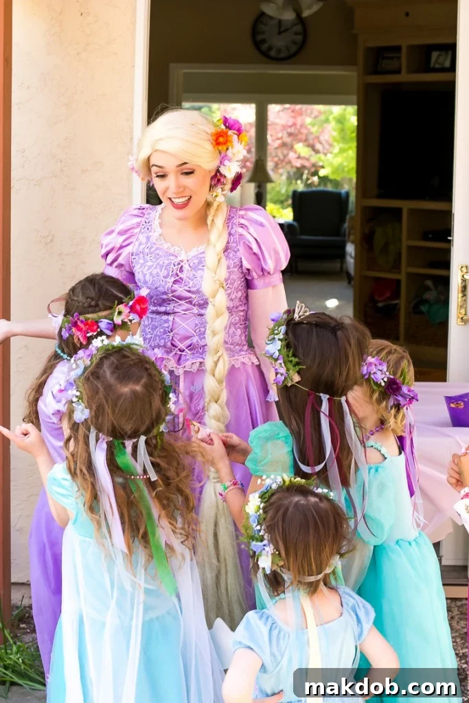 Rapunzel Character Performer Interacting with Children at a Princess Birthday Party