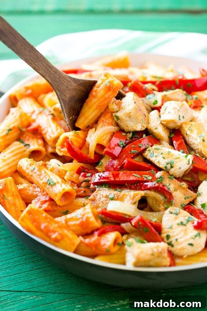 Spicy chicken rigatoni in a creamy tomato sauce, beautifully plated and ready to serve.