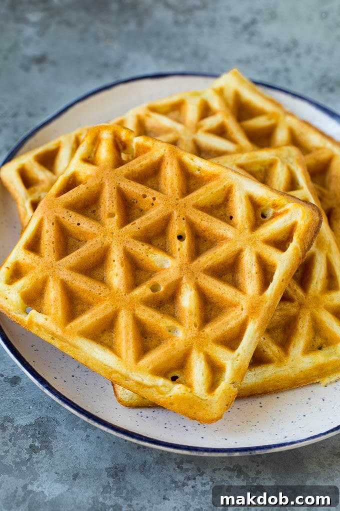 A plate of cooked waffles.