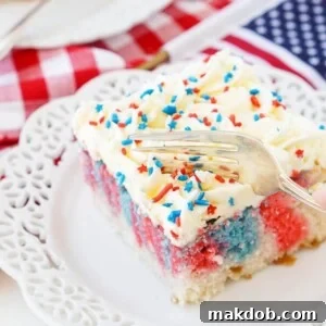 A picture of a slice of red, white and blue marble cake.