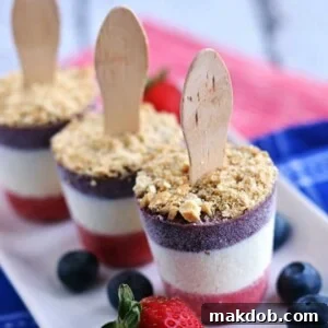 An image of a red, white, and blue cheesecake popsicle.