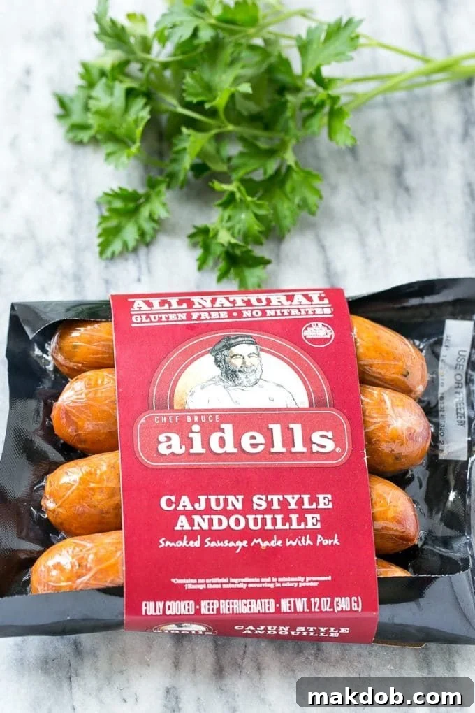 A package of Aidells smoked andouille sausage, a key ingredient for flavorful Cajun dishes.
